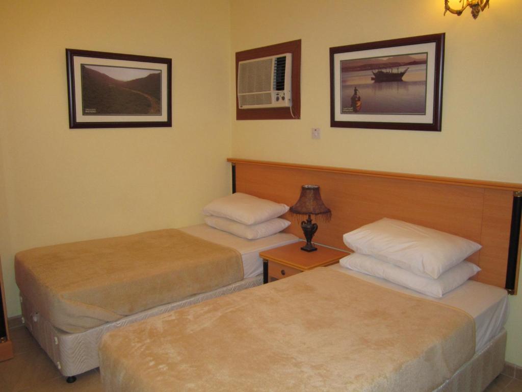 Muscat International Hotel Værelse billede